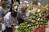 Buyers and sellers in the vegetable market in Santa Luzia, Funchal, Ilha da Madeira, Portugal