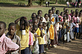 SOUTH SUDAN  Lutaya primary school, constructed and financed by Jesuit Refugee Services since 2005, Yei  Children line up in the morning before going into class