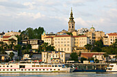 Serbia. Belgrade. Danube River Barges and Stari Grad (Old Town) / Sunset