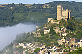 Najac village & castle in morning mist, Aveyron, France