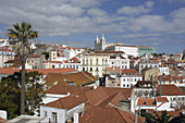 View of Alfama quarter from Miradouro (viewpoint) da Graça, São Vicente monastery in background. Lisbon, Portugal