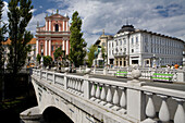 Church of the Annunciation from the Triple Bridge, and river Ljubljanica. Ljubljana, capital of Slovenia, Europe.