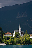 General view of Lake Bled and Church of San Martín, Bled, Slovenia, Europe.