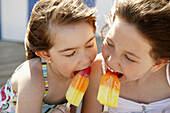 Summer 2 girls having fun with an Ice cream