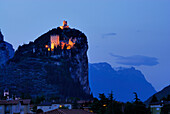 Illuminated castle ruin at night, Arco, Trentino-Alto Adige/Südtirol, Italy