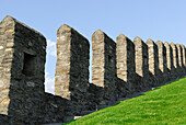 Defence walls of castle Castelgrande in UNESCO World Heritage Site Bellinzona, Bellinzona, Ticino, Switzerland