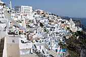 Houses at a mountainside in the sunlight, Fira, Santorini, Greece, Europe