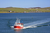Fishing boat at Lerwick, with Bressay beyond, Shetland, Scotland, UK
