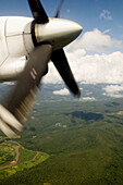 A view from an ATR 72 airlplane above the forests of North Thailand