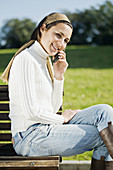 woman talking on the mobile in a park