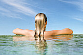 Back view of a woman in a pool