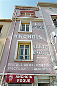 House facade with anchovy caption, Collioure, Languedoc-Roussillon, South France, France