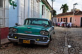 Vintage car near restaurant, Trinidad, Sancti Spiritus, Cuba, West Indies