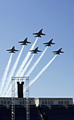 The Blue Angels fly over Naval Academy stadium