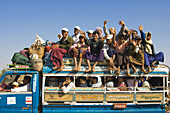 Bus overloaded with people, Bagan (Pagan), Myanmar (Burma)