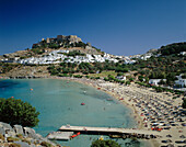 View of beach and town, Lindos, Rhodes Island, Greek Islands