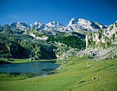 View of Picos Mountains across Lago de la Ercina, Cavadonga National Park, Asturias, Spain