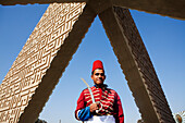 Soldier at the grave of President Sadat and the Memorial for the unknown soldier, District of Heliopolis, Cairo, Egypt, Africa