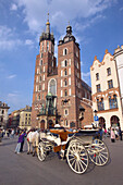 Grand Square, St Mary Church and horse and carriage, Krakow, Poland