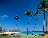 Beach and park by Ala Wai Harbour in Honolulu, Oahu Island, Hawaii, USA