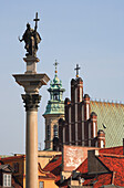 Old Town rooftops and Zygmunt Column, Warsaw, Poland