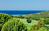 View over golf club to sea, Porto Pevero, Sardinia, Italy