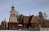 Old wooden church with snow, Petajavesi, Finland