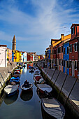 View along canal on Burano Island in the Venice Lagoon, Venice, Burano, Veneto, Italy