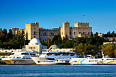 Mandraki Harbour and the Castle of the Knights, Rhodes Town, Rhodes Island, Greek Islands