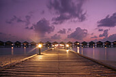Water bungalows at dusk, General, The Maldives