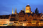 City skyline and Church of St Mary at night, Gdansk, Poland