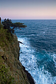Waves breaking on the cliff wall, hiking trail near Riomaggiore, Cinque Terre, La Spezia, Liguria, Italian Riviera, Italy, Europe
