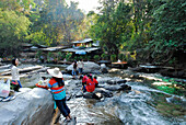Visitors and traders at Mae Klang waterfall, Doi Intanon National Park, Province Chiang Mai, Thailand, Asia