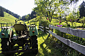 Tractor on alp, Samerberg, Chiemgau, Bavaria, Germany