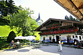Restaurant, Streichen chapel in backgorund, Schleching, Chiemgau, Bavaria, Germany