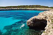 Cliffs and a cave in the bay Cala Mondragó, Mallorca, Balearic Islands, Mediterranean Sea, Spain, Europe