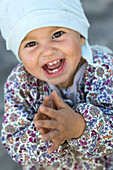 Portrait of a laughing little girl, Punta Conejo, Baja California Sur, Mexico, America