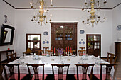 Dining room with dinner table, Casa Museo Palacio Spinola, aristocratic palace, 18th century, restored by architect and artist Cesar Manrique, Teguise, Lanzarote, Canary Islands, Spain, Europe