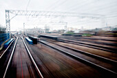 blurred, Color, Colour, Daytime, exterior, Fast, Horizontal, motion, movement, moving, outdoor, outdoors, outside, Rail, Railroad, Railroads, Rails, Railway, Railways, Speed, Track, Tracks, Train, Trains, Transport, Transportation, Transports, Travel, Tra