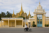 The entrance of the Royal Palace under clouded sky, Phnom Penh, Cambodia, Asia