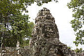 Stone faces of Bodhisattva Lokeshvara in the Bayon temple at Angkor, Siem Reap Province, Cambodia, Asia