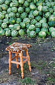 Watermelons and stool on the road side, Transylvania, Carpathian Mountains, Romania, Europe