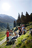 Family on pasture, Val di Fleres, South Tyrol, Trentino-Alto Adige/Südtirol, Italy