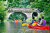 Passing A Stone Bridge, Canoeing-Kayaling Down The Huisne Between Margon And Nogent-Le-Rotrou, Region Of Perche, Eure-Et-Loir (28), France