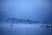 Fisherman In The Morning Mist, Aiguebelette Lake, Savoy (73), France