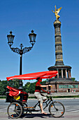 Taxibike In Front Of The Victory Column, Siegessaule, A 67M High Column Commemorating Prussian Military Victories, Topped By The 'Goldelse', Berlin, Germany