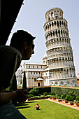 The Leaning Tower (Torre Pendente) Seen From The Museo Dell'Opera Del Duomo, Campo Dei Miracoli, Pisa, Tuscany, Italy