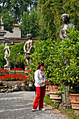 Garden In The Palazzo Pfanner With Its Statues, Its Rosebushes And Lemon Trees, Lucca, Tuscany, Italy