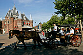 Horse-Drawn Cart In Front Of 'De Waag', Medieval Tower Of The Saint Anthony Gate, Nieuwmarkt Square, Amsterdam, Netherlands