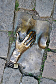 Sculpture Of A Hand Touching A Breast, Incrusted In The Streets Of The Red Light District, Amsterdam, Netherlands